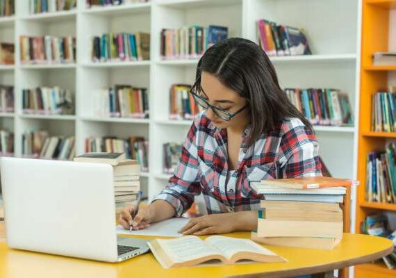Distance education in India illustration featuring SCDL, Amity University and LPU study support with solved papers and project resources
